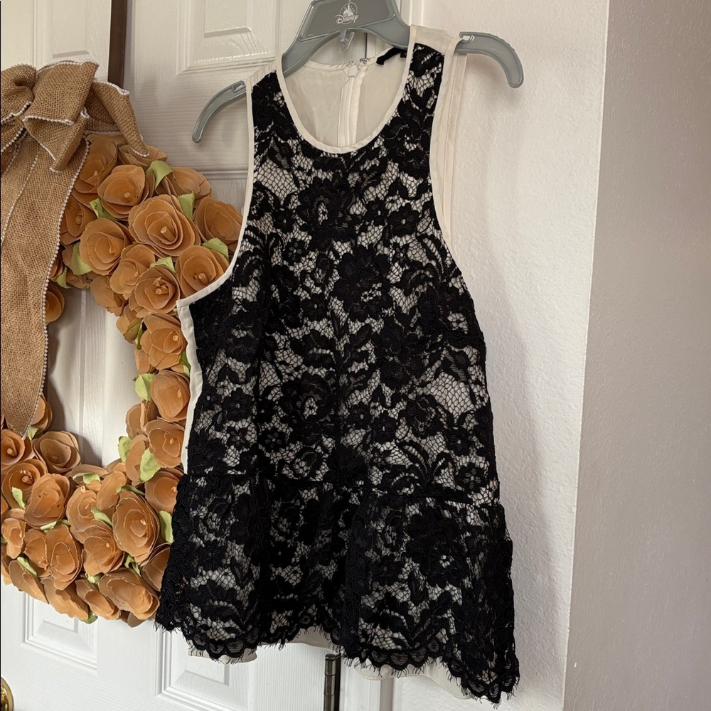 TIBI lace peplum top sleeveless size 2 black white